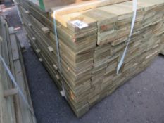 LARGE PACK OF PRESSURE TREATED FEATHER EDGE FENCE CLADDING BOARDS. 1.5M LENGTH X 100MM WIDTH APPROX.