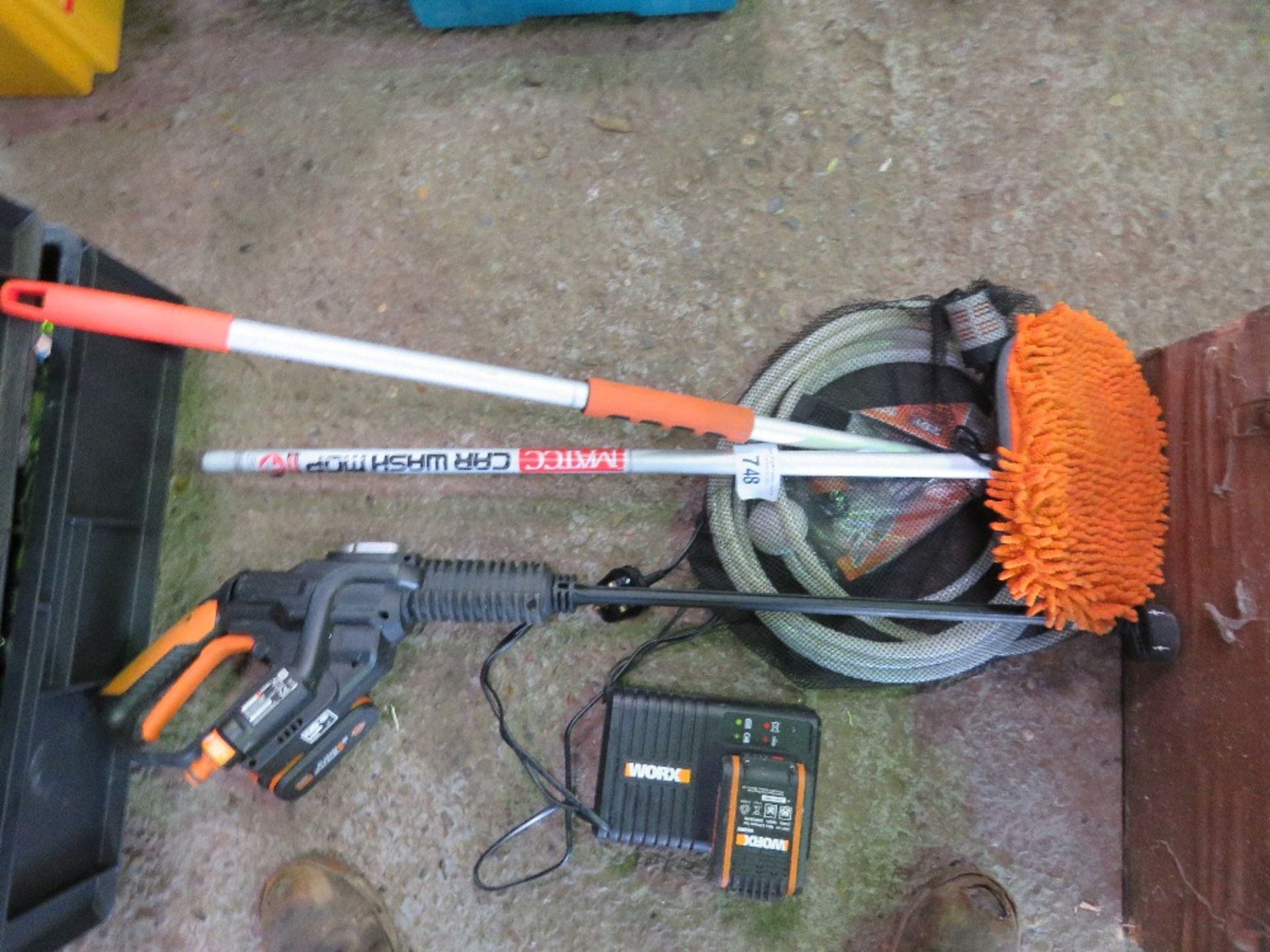 WORX BATTERY PRESSURE WASHER PLUS A LONG REACH BRUSH. THIS LOT IS SOLD UNDER THE AUCTIONEERS MARGIN