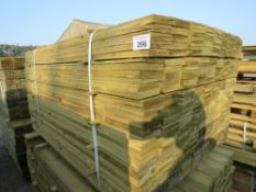 LARGE PACK OF PRESSURE TREATED FEATHER EDGE FENCE CLADDING BOARDS. 1.35M LENGTH X 100MM WIDTH APPROX