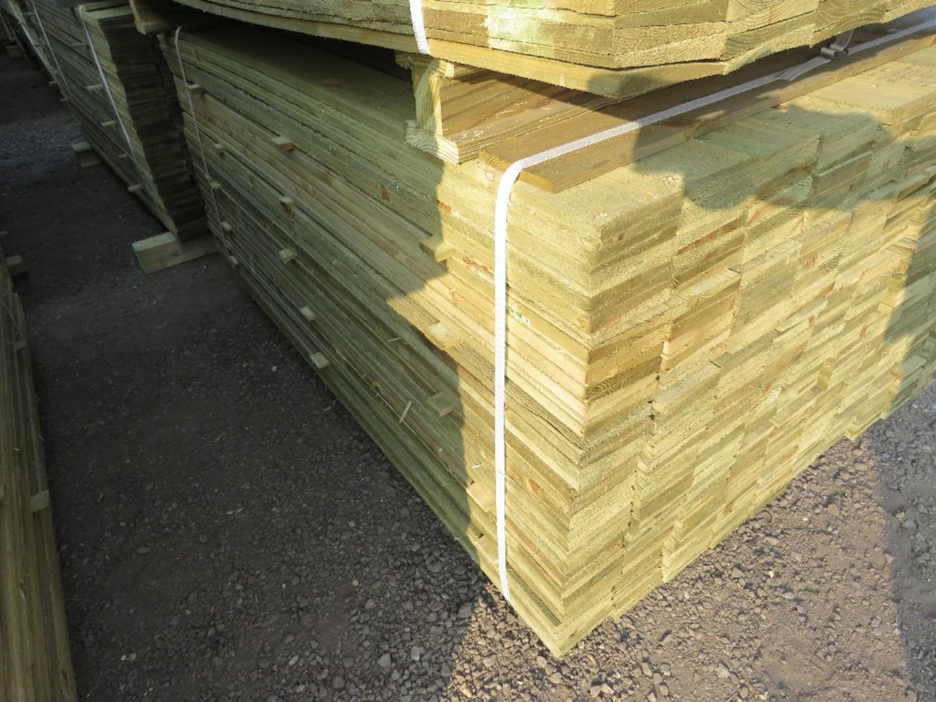 LARGE PACK OF PRESSURE TREATED FEATHER EDGE FENCE CLADDING BOARDS. 1.5M LENGTH X 100MM WIDTH APPROX. - Image 3 of 3