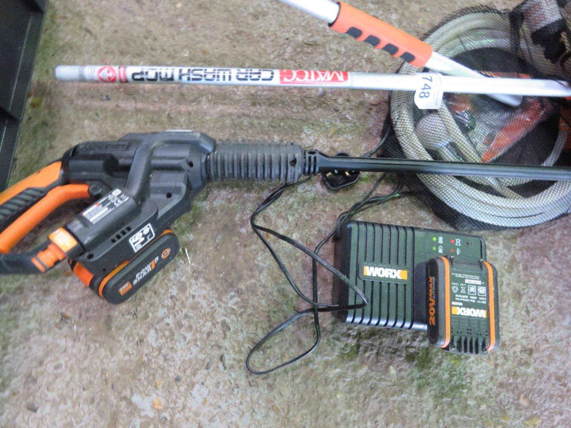 WORX BATTERY PRESSURE WASHER PLUS A LONG REACH BRUSH. THIS LOT IS SOLD UNDER THE AUCTIONEERS MARGIN - Image 2 of 2