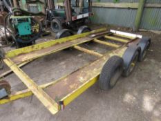 TWIN AXLED CAR TRAILER WITH RAMPS. BED SIZE 13FT LENGTH X 6FT WIDTH APPROX. KEY IN OFFICE FOR LOCKIN