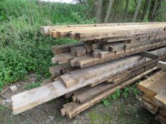 LARGE STACK OF HEAVY PRE USED MAINLY DENAILED TIMBERS, 16FT-20FT LENGTH APPROX, MAINLY 3" X 9" SIZE.