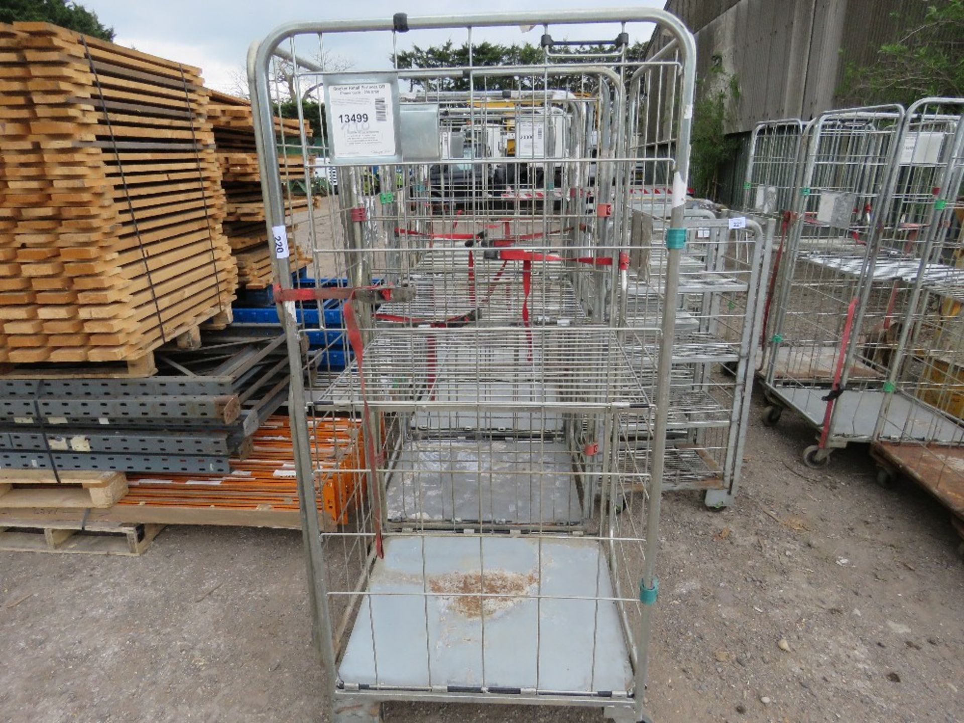 4 X LARGE MESH SIDED TROLLEYS.