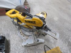 DEWALT PROFESSIONAL MITRE SAW, 110VOLT POWERED. DESCRIBED AS WORKING BUT REQUIRES A NEW BEARING ON B
