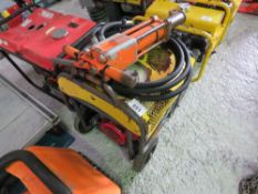 ATLAS COPCO HYDRAULIC BREAKER PACK WITH HOSE AND GUN.