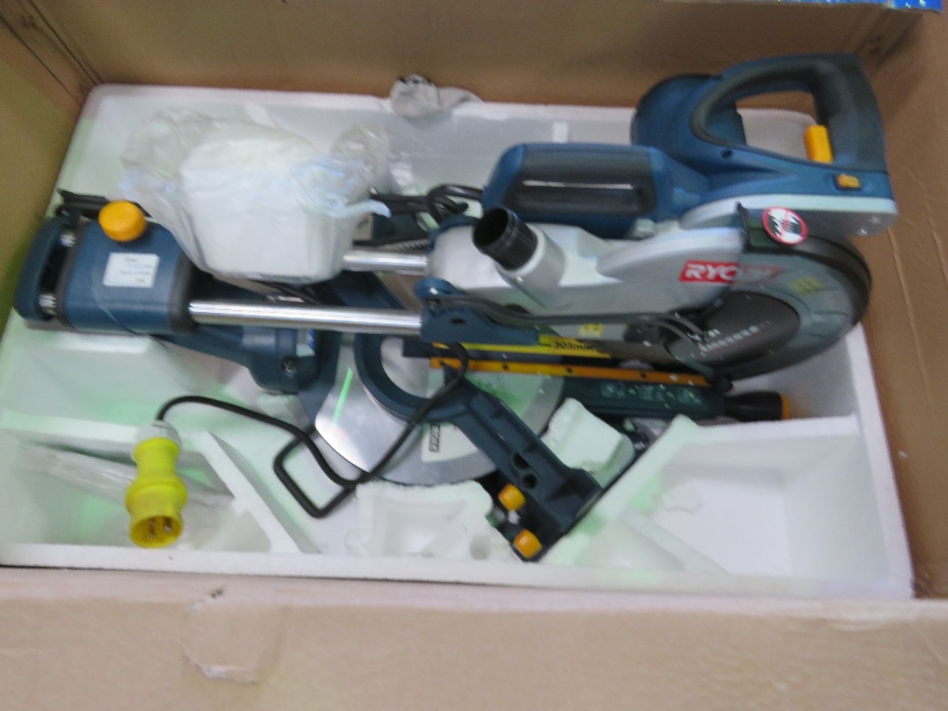 BOXED RYOBI 110VOLT COMPOUND MITRE SAW.