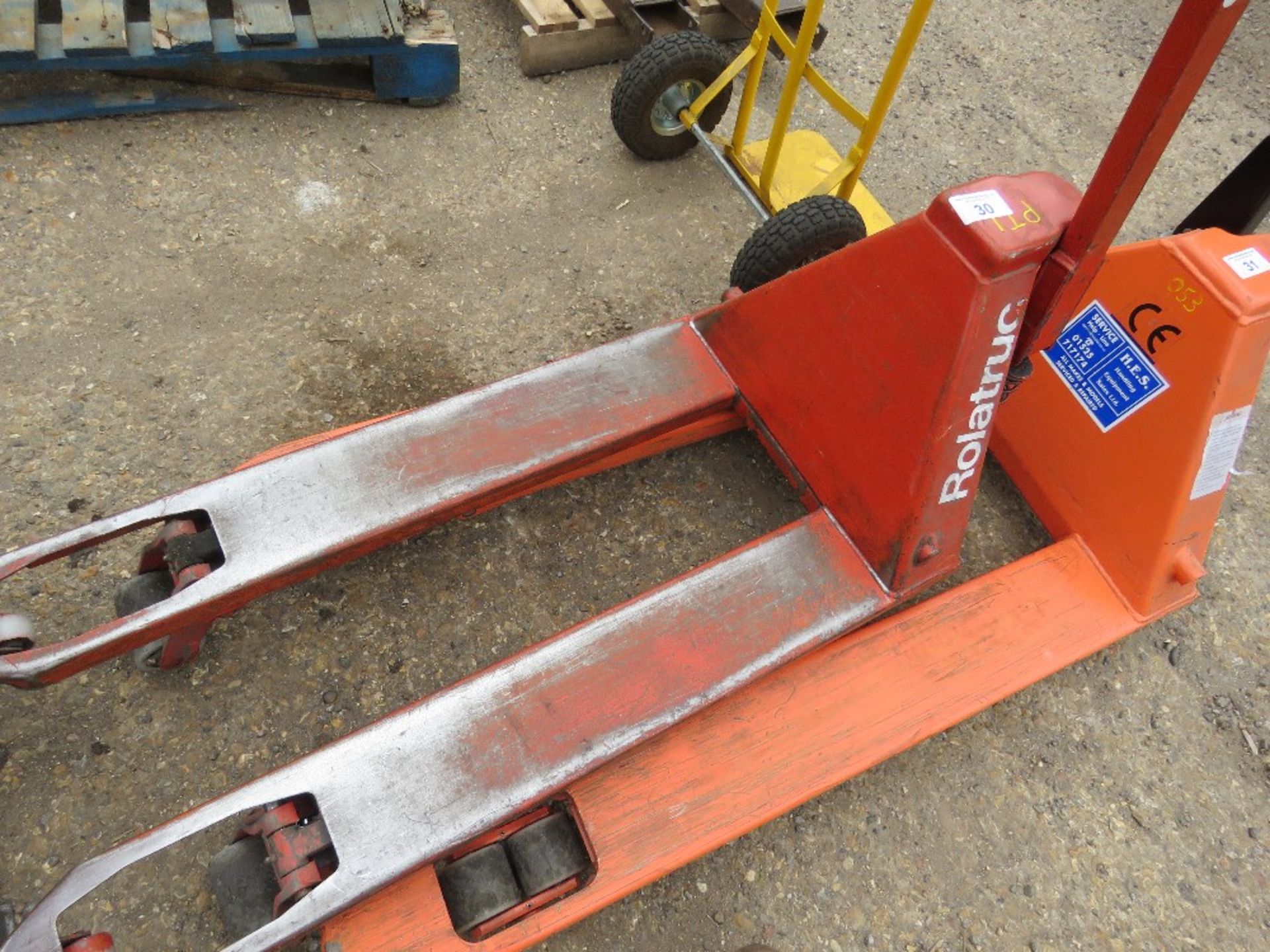ROLATRUC PALLET TRUCK. WHEN TESTED WAS SEEN TO LIFT AND LOWER. SOURCED FROM COMPANY LIQUIDATION. THI