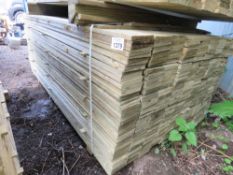 LARGE PACK OF FEATHER EDGE TREATED CLADDING BOARDS. 1.8M LENGTH X 10CM WIDTH APPROX