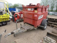 TRANSCUBE 950 LITRE SINGLE AXLED ROAD TOW BUNDED BOWSER TANK YEAR 2005 WITH HAND PUMP AND HOSE.