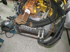 ATLAS COPCO HYDRAULIC BREAKER PACK WITH HOSE AND GUN.