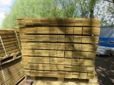 PACK OF PRESSURE TREATED HIT AND MISS TIMBER CLADDING STRIPS . 1.14M LENGTH 10CM WIDTH APPROX.