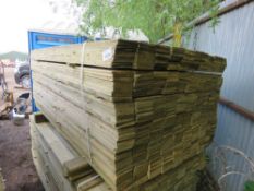 LARGE PACK OF FEATHER EDGE TREATED CLADDING BOARDS. 1.8M LENGTH X 10CM WIDTH APPROX