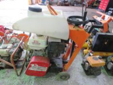 CLIPPER PETROL ENGINED FLOOR SAW WITH TANK AND BLADE. THIS LOT IS SOLD UNDER THE AUCTIONEERS MARGIN