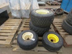 4 X COMPACT TRACTOR/MOWER WHEELS AND GRASS TYRES. THIS LOT IS SOLD UNDER THE AUCTIONEERS MARGIN SCHE