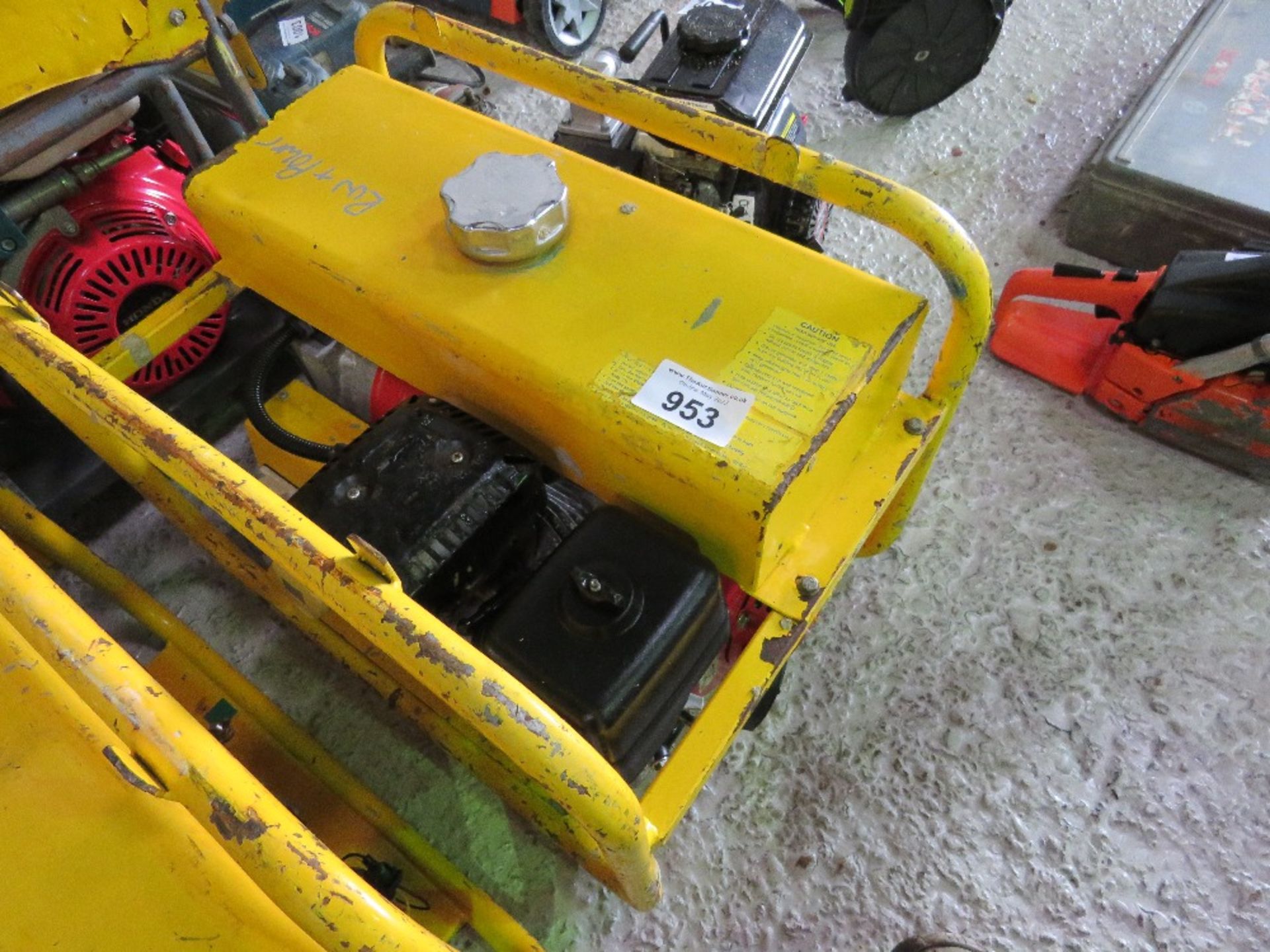 YELLOW HONDA ENGINED PETROL ENGINED GENERATOR.