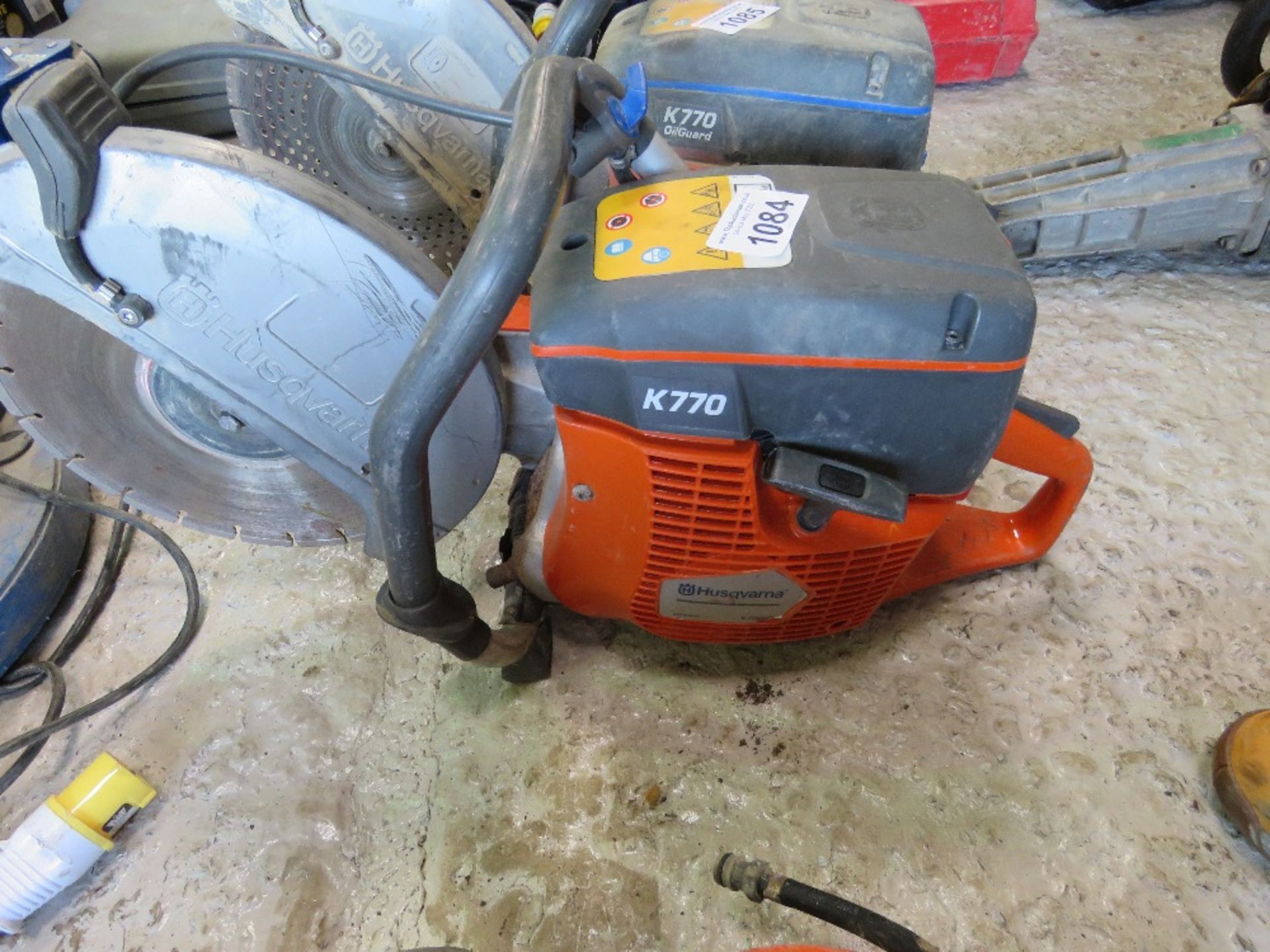 HUSQVARNA K770 PETROL SAW, WITH BLADE.