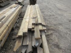 STACK OF HEAVY PRE USED MAINLY DENAILED TIMBERS, 8FT-15FT LENGTH APPROX, MAINLY 4-4.5" X 2" SIZE. TH