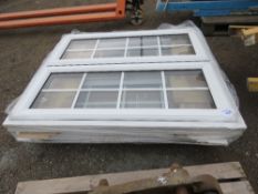 2 X PVC WINDOW FRAMES WITH GLASS 107CM X 131CM APPROX WITH CILL. THIS LOT IS SOLD UNDER THE AUCTIONE