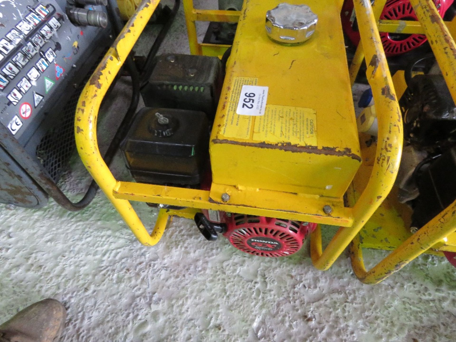 YELLOW HONDA ENGINED PETROL ENGINED GENERATOR. - Image 2 of 2