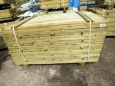 LARGE PACK OF FEATHER EDGE TREATED CLADDING BOARDS. 1.5M LENGTH X 10CM WIDTH APPROX.