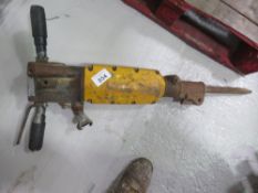 ATLAS COPCO AIR BREAKER WITH POINT. THIS LOT IS SOLD UNDER THE AUCTIONEERS MARGIN SCHEME, THEREFORE