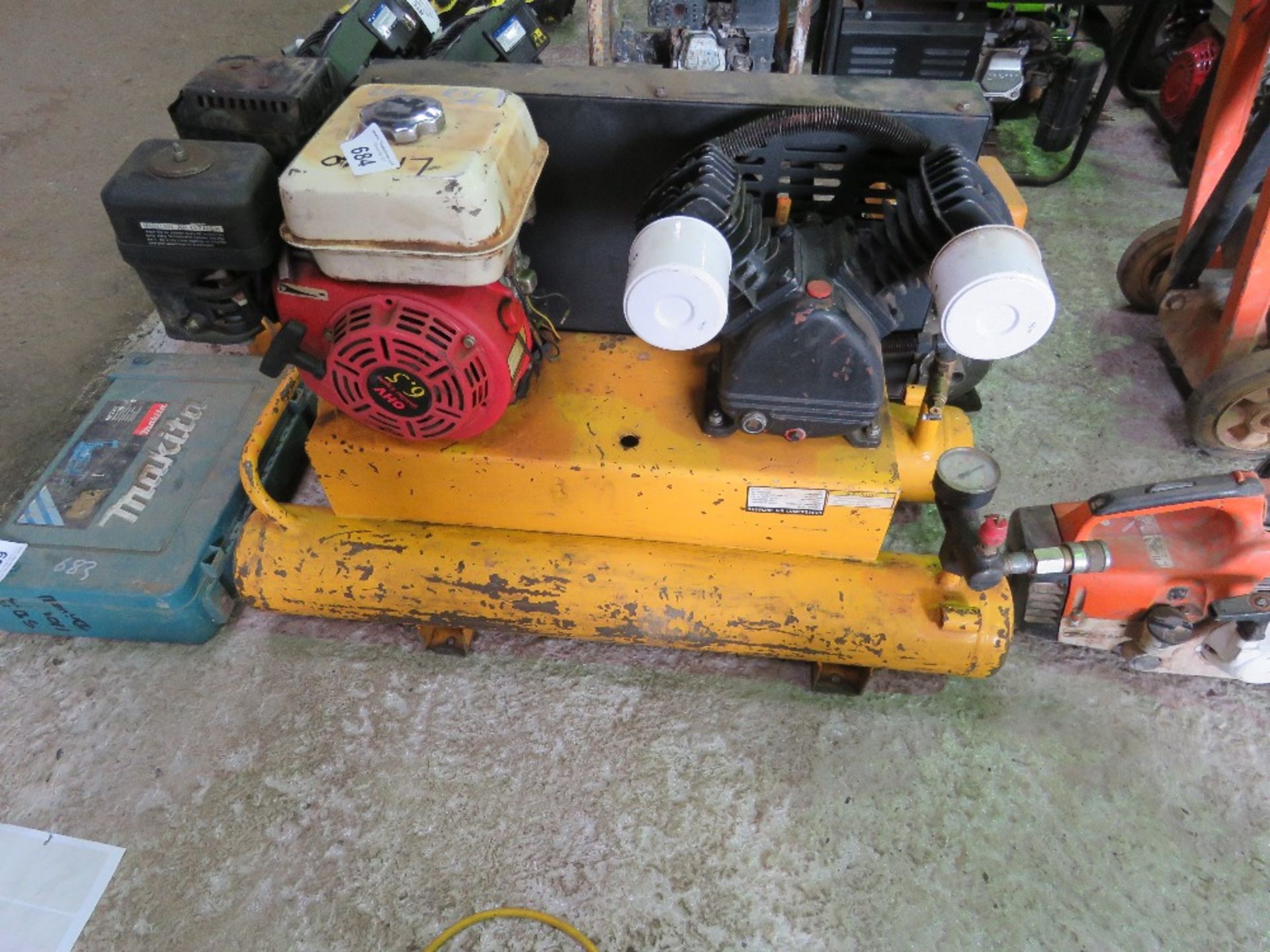 TWIN TANKED PETROL ENGINED COMPRESSOR UNIT. THIS LOT IS SOLD UNDER THE AUCTIONEERS MARGIN SCHEME, TH