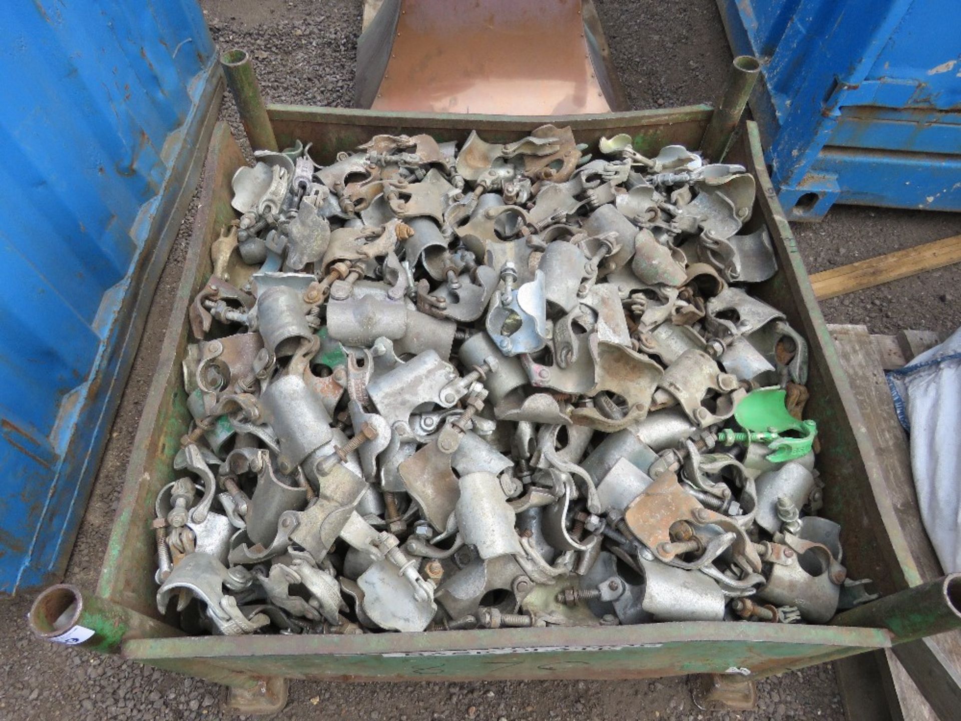 STILLAGE CONTAINING APPROXIMATELY 870 SCAFFOLD CLIPS. NO VAT ON HAMMER PRICE.