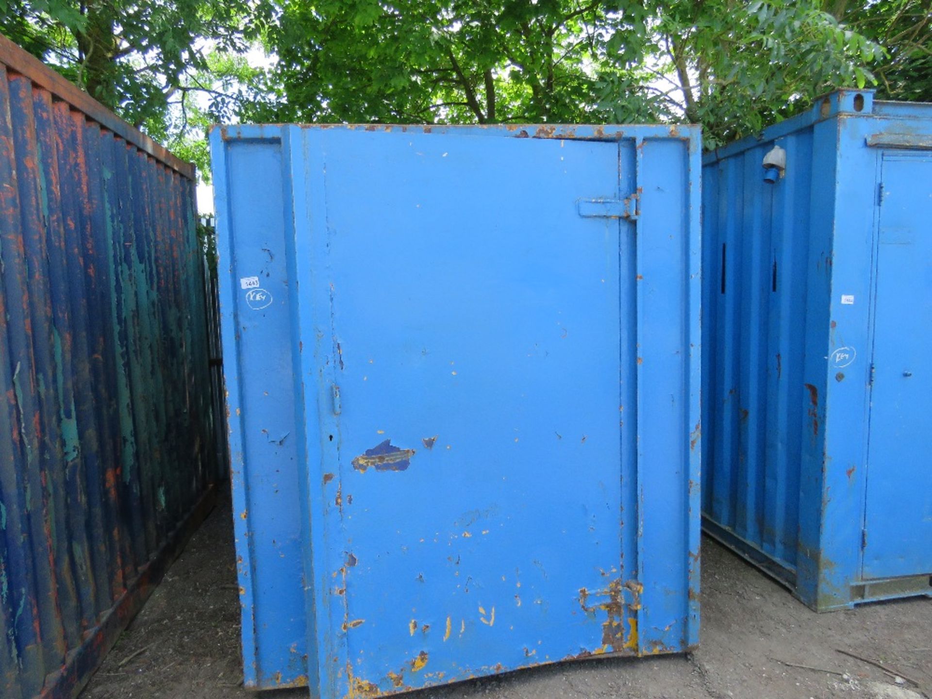 CHAIN LIFT SKIP TYPE ENCLOSED STORAGE CONTAINER 6FT WIDE X 10FT LENGTH APPROX WITH KEY. TS13.