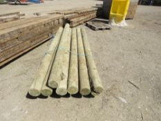 7 X ROUND TIMBER FENCE POSTS 8FT LENGTH APPROX. THIS LOT IS SOLD UNDER THE AUCTIONEERS MARGIN SCHEME