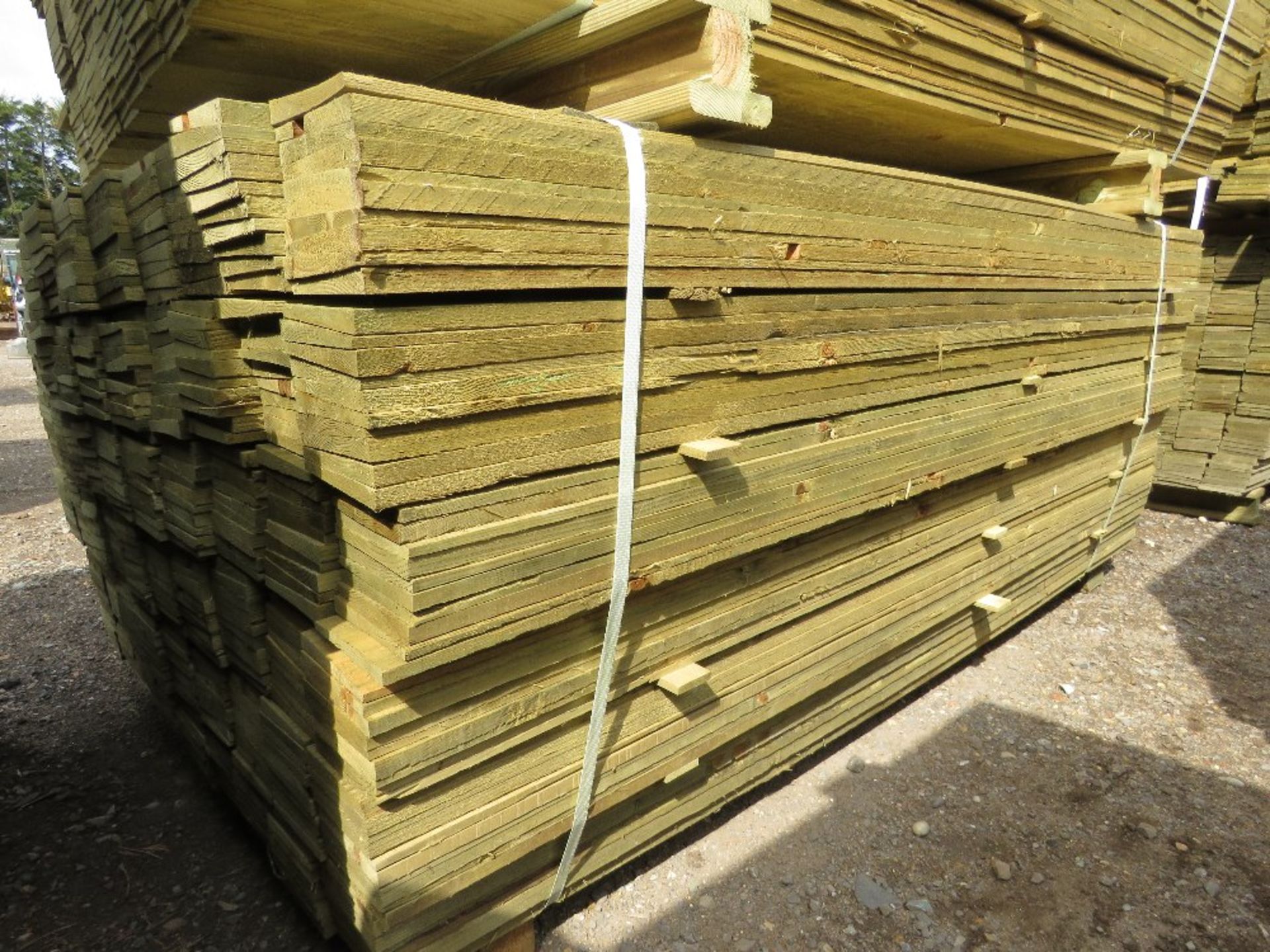 LARGE PACK OF PRESSURE TREATED FEATHER EDGE FENCE CLADDING TIMBERS. 1.80M LENGTH X 10CM WIDTH APPROX - Image 2 of 4