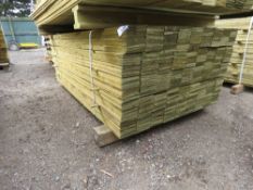 LARGE PACK OF PRESSURE TREATED FEATHER EDGE FENCE CLADDING TIMBERS. 1.65M LENGTH X 10CM WIDTH APPROX