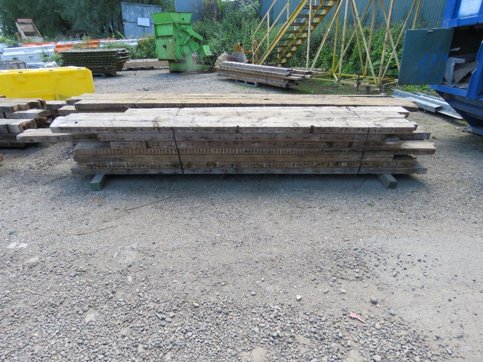LARGE BUNDLE OF DENAILED TIMBER BEAMS/JOISTS, MAINLY 9"X3", 12-14FT LENGTH APPROX. THIS LOT IS SOLD
