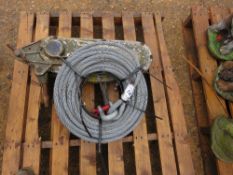 TIRFOR TYPE CABLE WINCH WITH A ROLL OF UNUSED CABLE AND A SHACKLE.