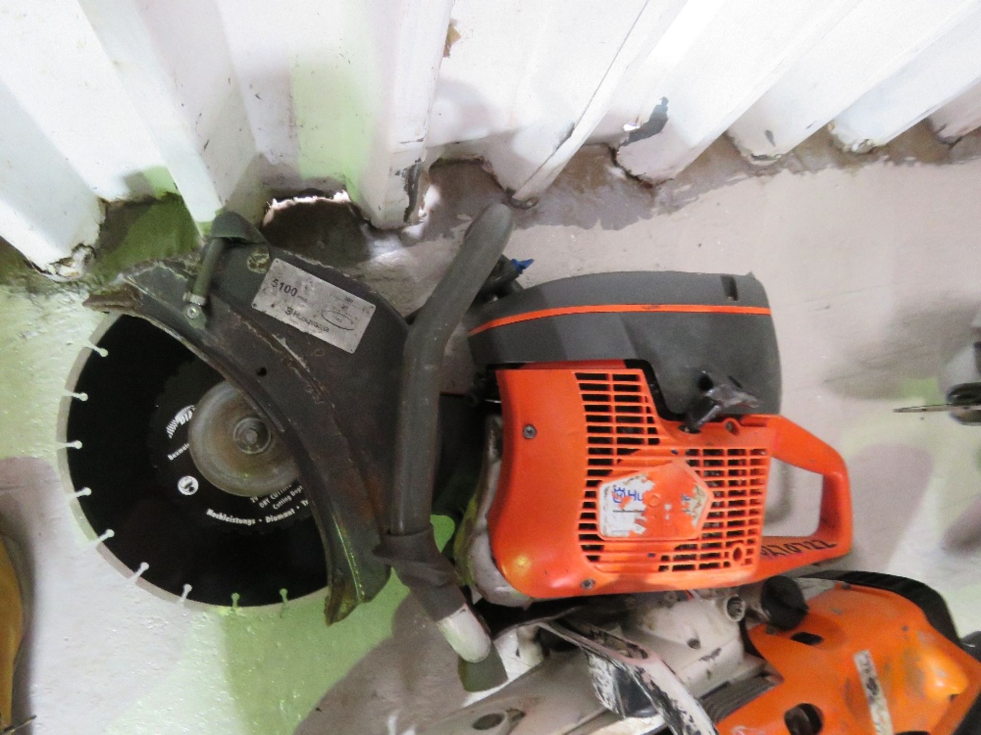 HUSQVARNA PETROL SAW WITH A BLADE.