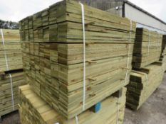 LARGE PACK OF PRESSURE TREATED FEATHER EDGE FENCE CLADDING TIMBERS. 0.9M LENGTH X 10CM WIDTH APPROX.