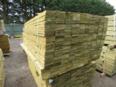 LARGE PACK OF PRESSURE TREATED FEATHER EDGE FENCE CLADDING TIMBERS. 1.80M LENGTH X 10CM WIDTH APPROX