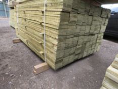 LARGE PACK OF PRESSURE TREATED FEATHER EDGE FENCE CLADDING TIMBERS. 1.65M LENGTH X 10CM WIDTH APPROX