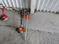 STIHL PETROL ENGINED POWER HEAD PLUS 2 X STRIMMER ATTACHMENTS. THIS LOT IS SOLD UNDER THE AUCTIONEER
