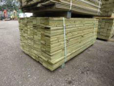 LARGE PACK OF PRESSURE TREATED FEATHER EDGE FENCE CLADDING TIMBERS. 1.80M LENGTH X 10CM WIDTH APPROX