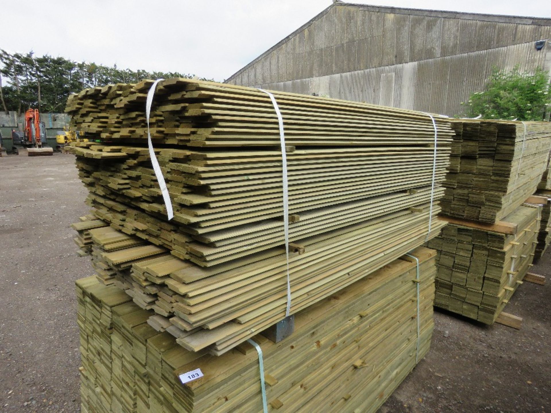 LARGE PACK OF PRESSURE TREATED SHIPLAP FENCE CLADDING TIMBERS. 1.75M LENGTH X 9.5CM WITH APPROX.