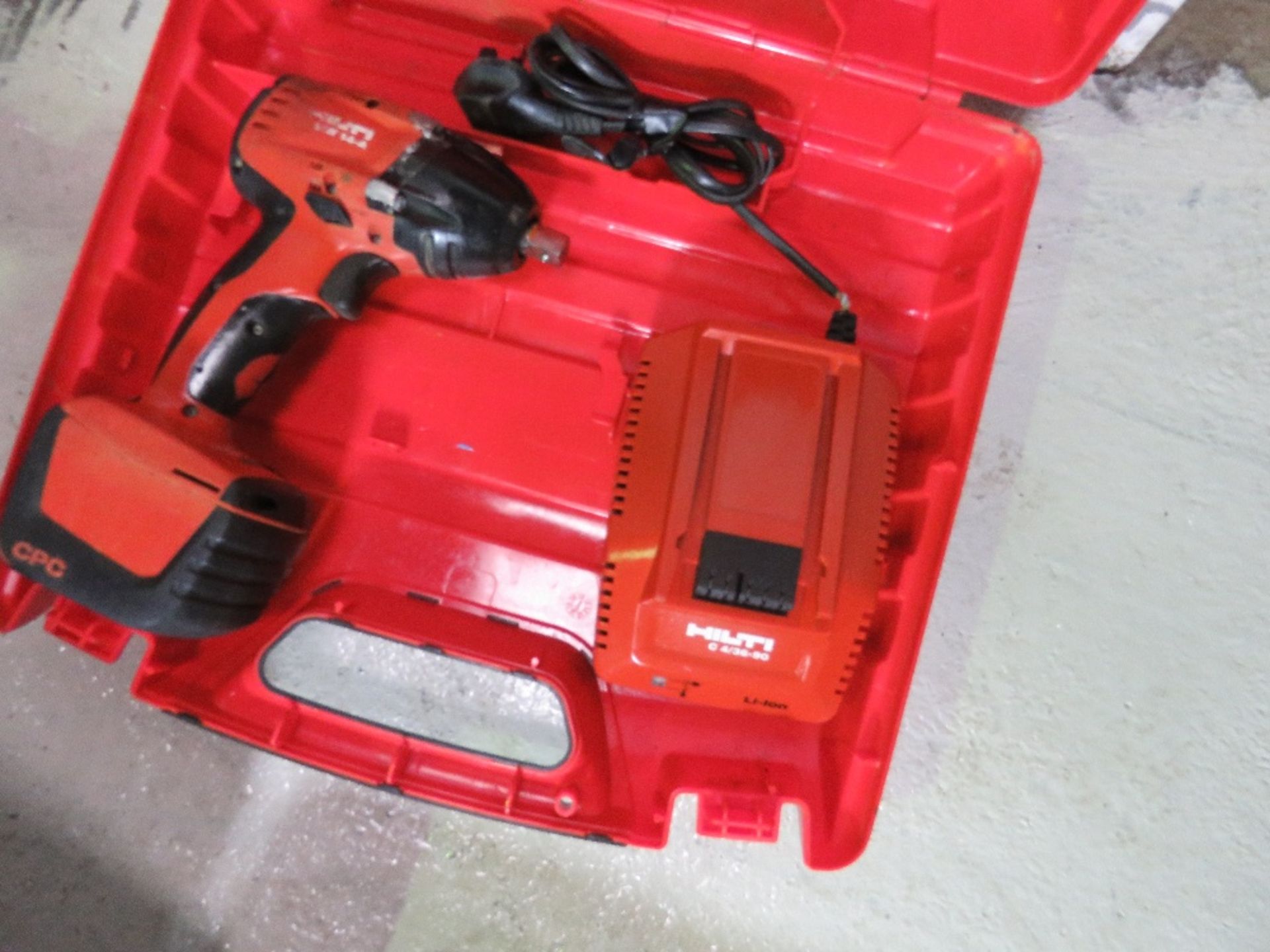 HILTI BATTERY POWERED NUT GUN SET.