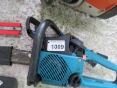 MAKITA PETROL ENGINED CHAINSAW. THIS LOT IS SOLD UNDER THE AUCTIONEERS MARGIN SCHEME, THEREFORE NO V