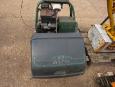 CYLINDER MOWER WITH BOX AND TRANSPORT WHEELS.