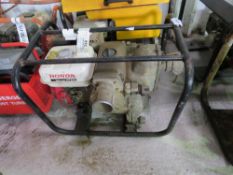 HONDA ENGINED HIGH OUTPUT 2" WATER PUMP. THIS LOT IS SOLD UNDER THE AUCTIONEERS MARGIN SCHEME, THERE