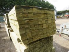 LARGE PACK OF PRESSURE TREATED FEATHER EDGE FENCE CLADDING TIMBERS. 1.80M LENGTH X 10CM WIDTH APPROX