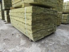 LARGE PACK OF PRESSURE TREATED FEATHER EDGE FENCE CLADDING TIMBERS. 1.80M LENGTH X 10CM WIDTH APPROX