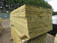 LARGE PACK OF PRESSURE TREATED FEATHER EDGE FENCE CLADDING TIMBERS. 1.80M LENGTH X 10CM WIDTH APPROX