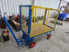 4 WHEELED TROLLEY WITH MESH SIDES, VERY LITTLE USEAGE. THIS LOT IS SOLD UNDER THE AUCTIONEERS MARGIN