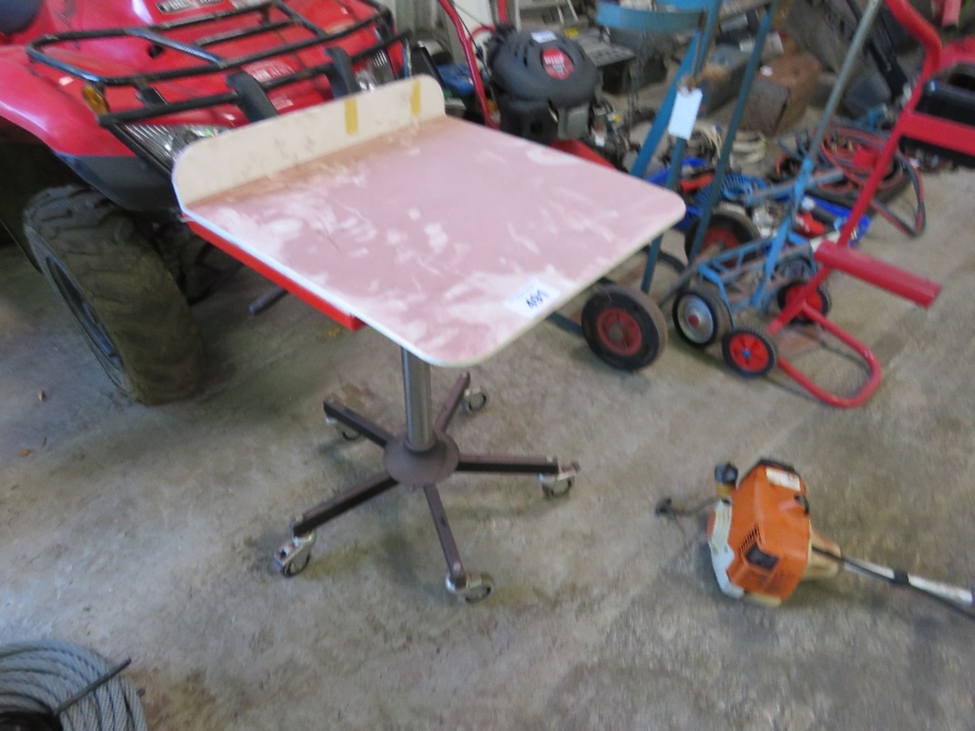 ADJUSTABLE HEIGHT WORK TABLE. THIS LOT IS SOLD UNDER THE AUCTIONEERS MARGIN SCHEME, THEREFORE NO VAT